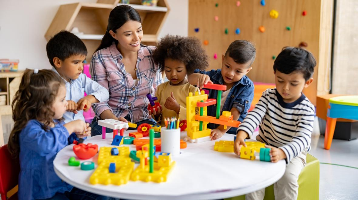 Kids on the Table with Teacher - Preschool Age Range