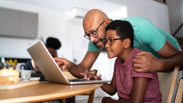 Man and Kid Using Laptop - Fun Websites for Kids